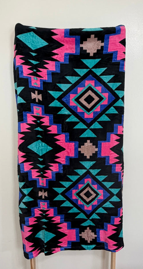Aztec geometric print fleece throw blanket in black, teal, pink, and blue